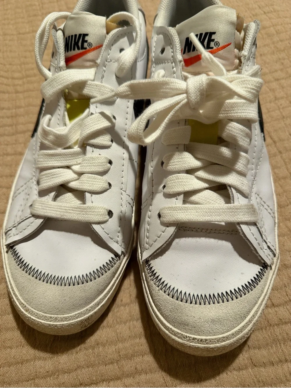 Nike Kids White Sneakers with Black Swoosh